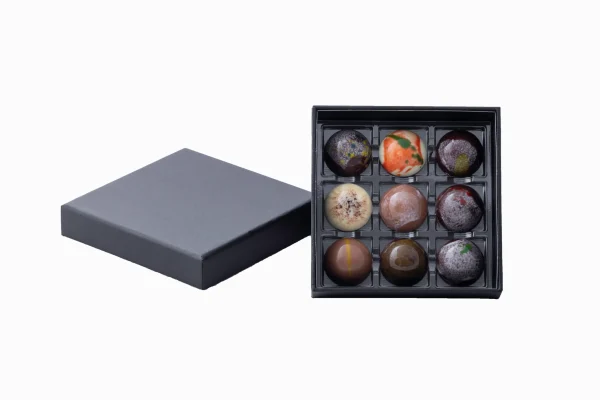 Doosje pralines (9 stuks)